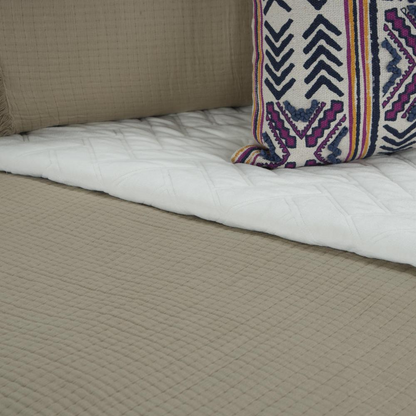 Start2Finish Donny Osmond quilt in 106x92 inches with colorful patterned fabric, displayed spread out on a bed.