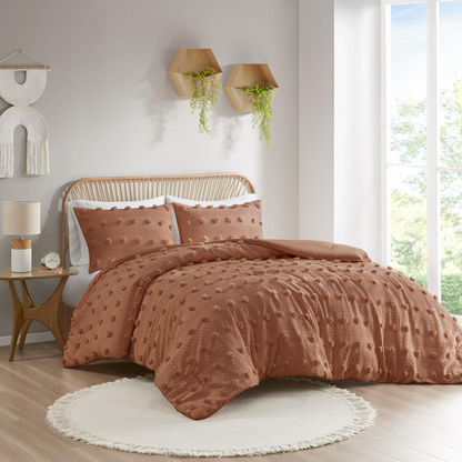 Start2Finish Lucy Clip Jacquard Comforter Set in rust color, featuring intricate woven patterns and a plush, comfortable bedding design.