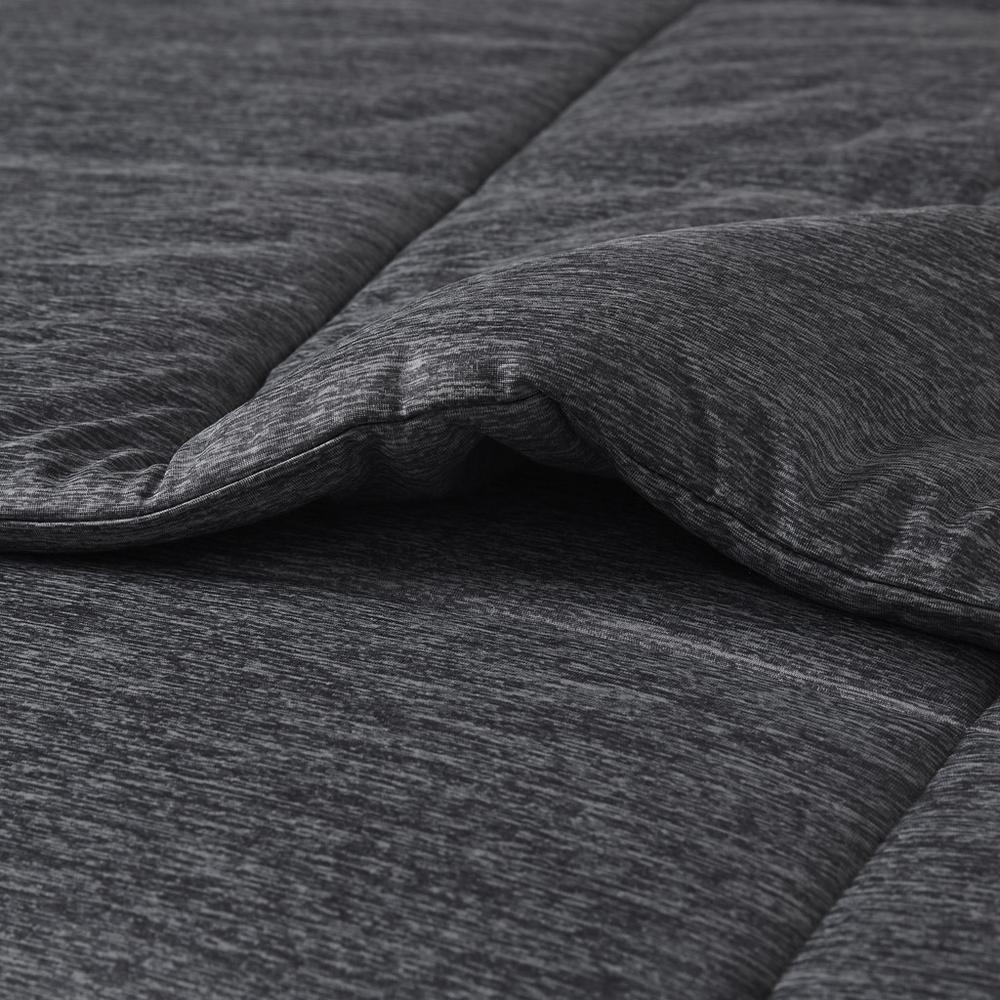 Start2Finish oversized down alternative comforter on a bed showing its plush, cozy bedding with a neutral color and soft texture.