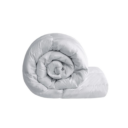 Large goose feather and down oversize comforter by Start2Finish, showcasing soft, plush bedding with a quilted white cover.