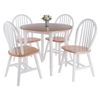 Sorella 5-piece drop leaf dining table with white and natural wood finish, paired with Windsor style chairs, in a modern dining room setting.