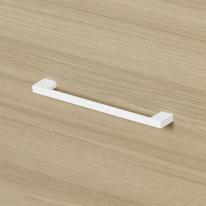 White Munich 2-drawer nightstand with soft elm finish, featuring modern furniture design and sleek metal handles.