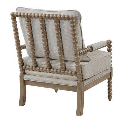 Fletcher Spindle Chair in fog fabric with rustic brown wooden finish, featuring a classic spindle back and cushioned seat.
