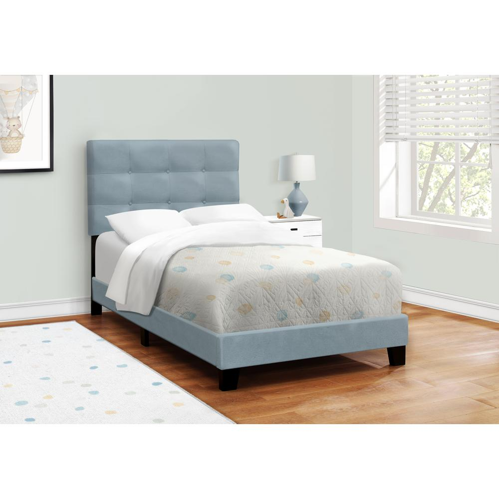 Light blue velvet twin size upholstered bed frame with a transitional design, showcasing a sturdy wooden structure and plush fabric.