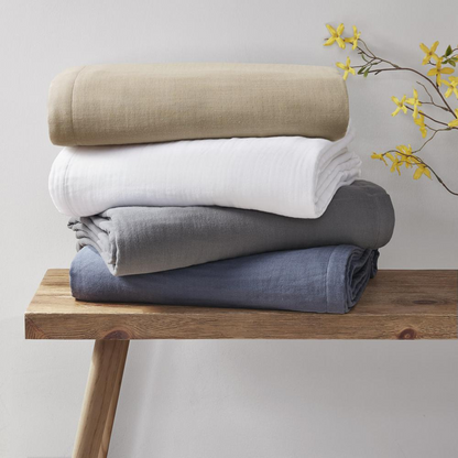 Lightweight tan cotton gauze blanket by Start2Finish, showing soft, breathable fabric with a gentle drape.