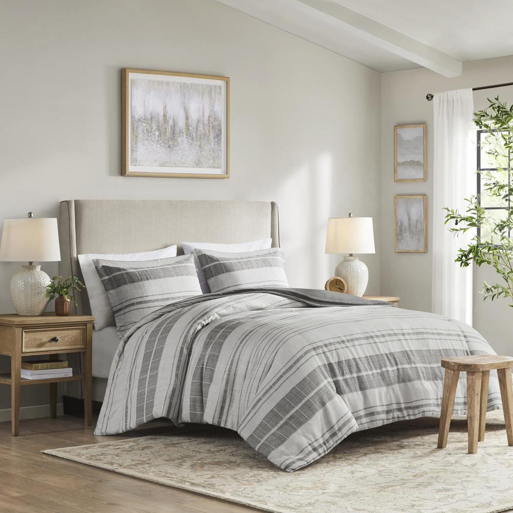 Start2Finish 3-piece stripe duvet cover bedding set with matching pillow shams in navy and white, showing the striped pattern.