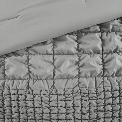Start2Finish Evelyn 3-piece stripe ruched grey comforter bedding set with matching pillow shams on a bed.