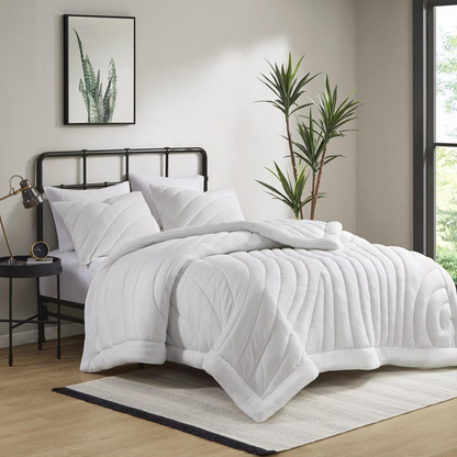 Start2Finish poly jersey puffy comforter set with soft, cozy fabric and plush filling, shown on a neatly made bed.