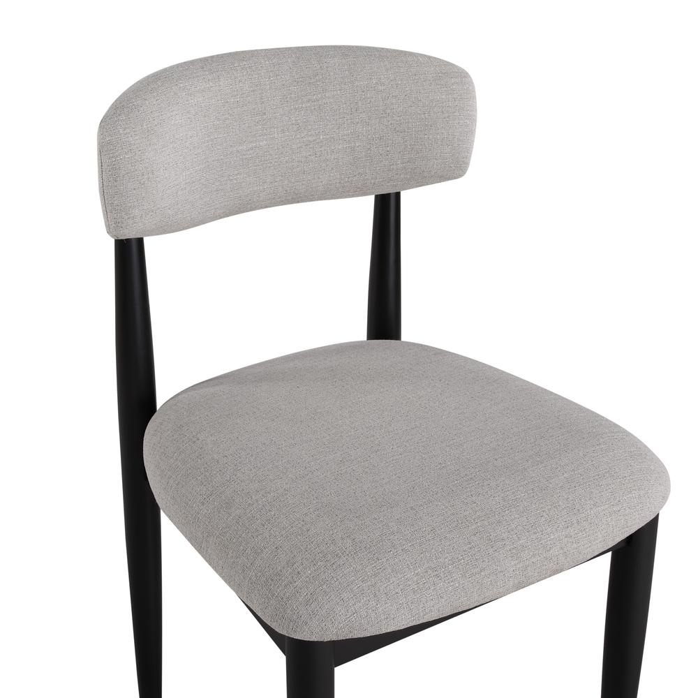 Magnolia upholstered black side chair by Start2Finish with cushioned seat and backrest, modern design, and wooden legs.