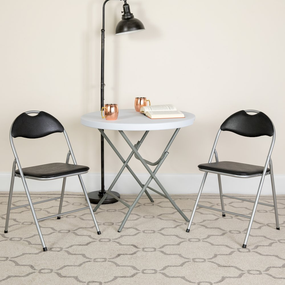 Set of 2 padded metal folding chairs by Start2Finish, showcasing sturdy frames and cushioned seats for comfortable seating.