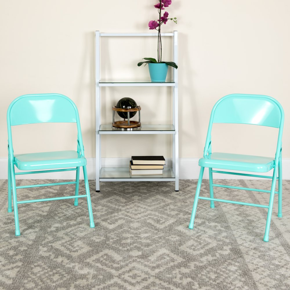 Set of 2 contemporary metal folding chairs by Start2Finish, suitable for commercial and residential use, shown folded and open.
