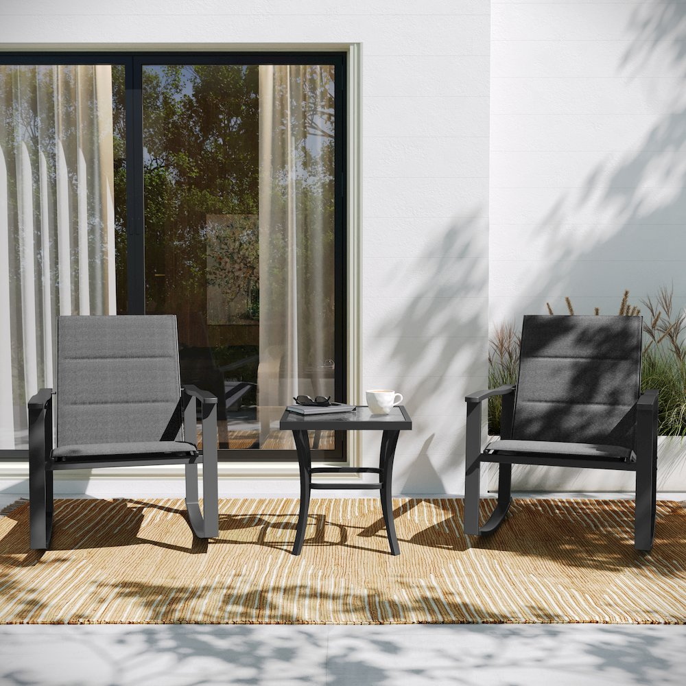 Modern 3-piece outdoor rocking chair and table set by Start2Finish with metal frames and wooden seats on a patio.