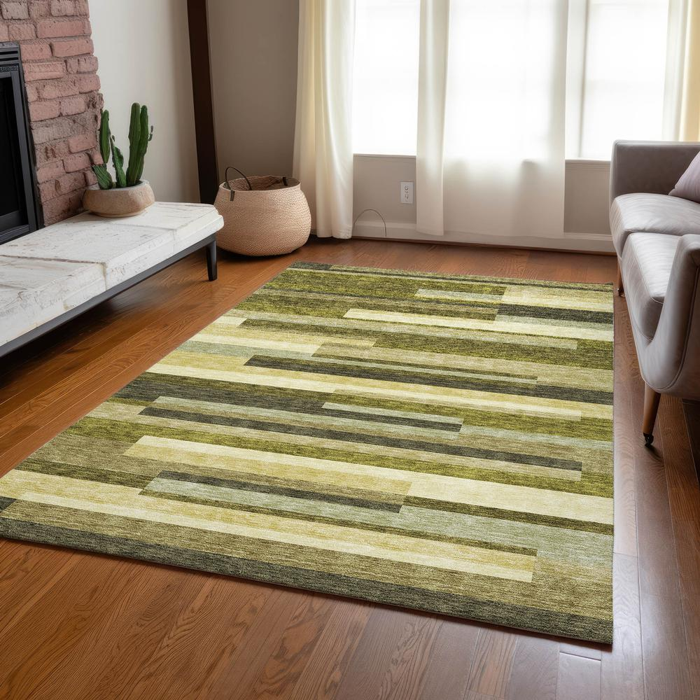 Start2Finish Chantille ACN956 green 5x7.6 rug showing soft woven texture and vibrant color pattern on the floor.
