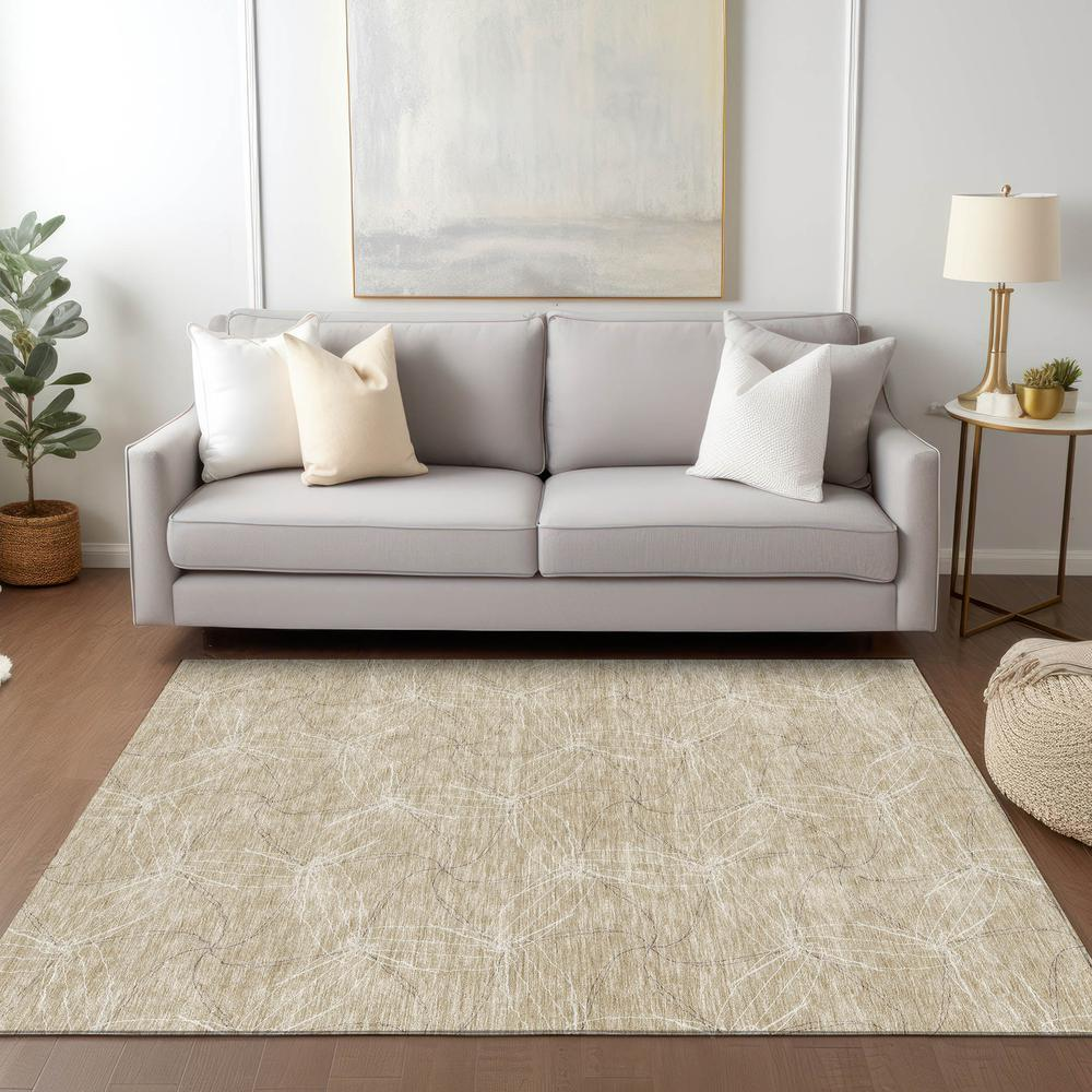 Start2Finish Chantille ACN968 brown 10x14 rug with soft texture and intricate pattern, shown in a living room setting.