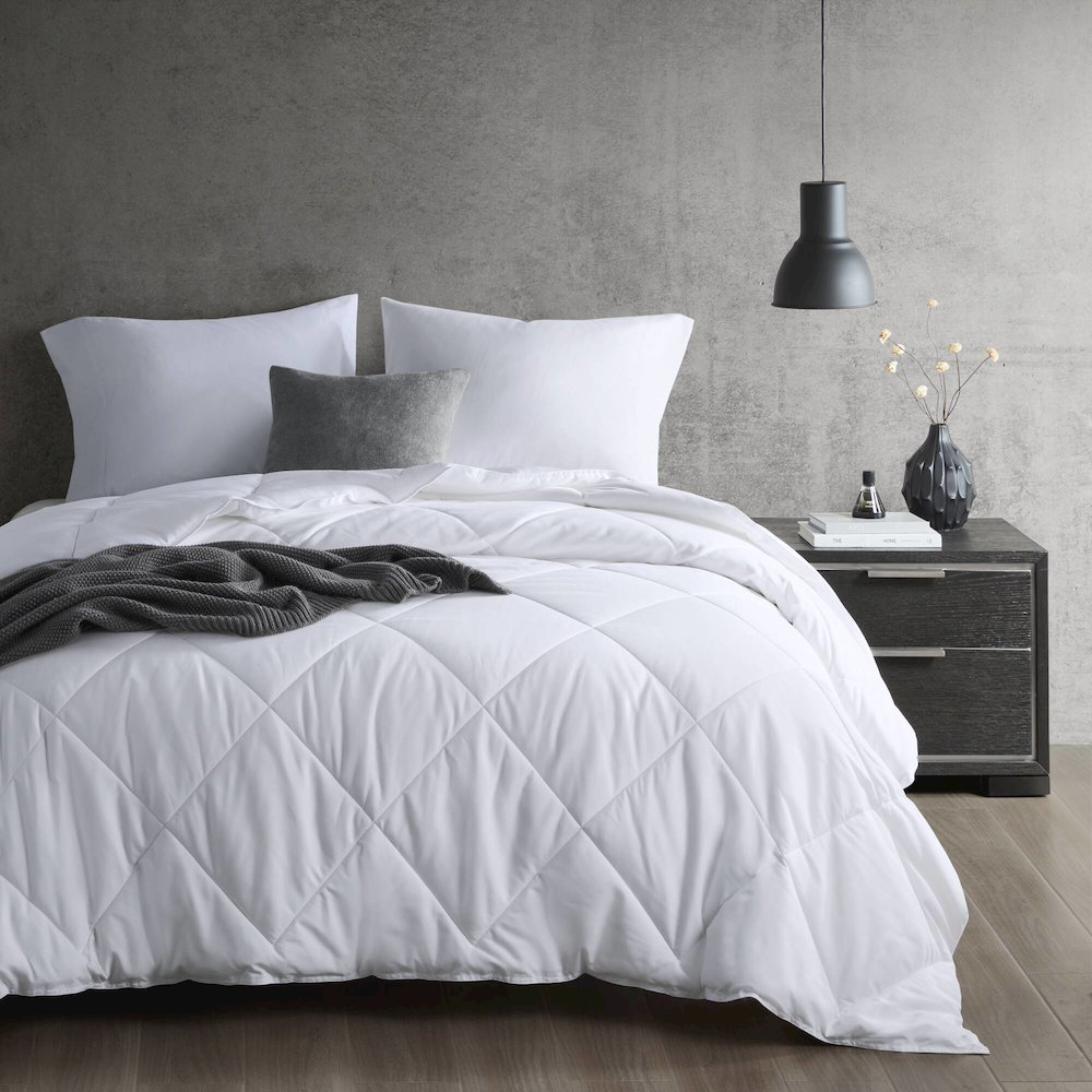 Start2Finish cooling touch oversized down alternative comforter in white, showcasing plush fabric and spacious design.
