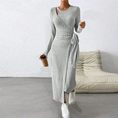 Elegant long dress by Jade Iapetus featuring solid European and Egyptian-inspired sleeve designs and flowing fabric.