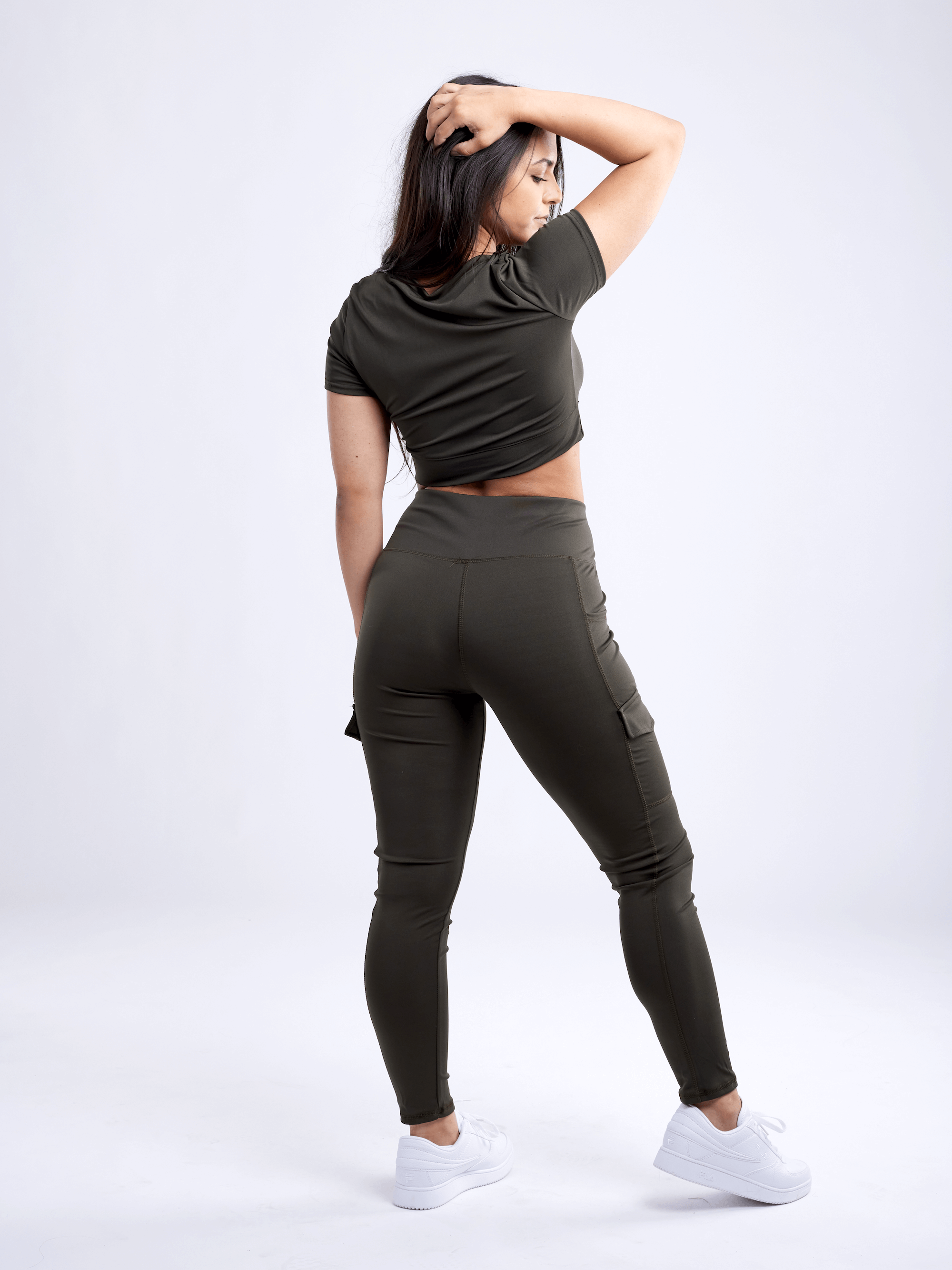 Black Lavender JupiterGear short-sleeve crop top, activewear with a fitted design and breathable fabric, displayed on a white background.