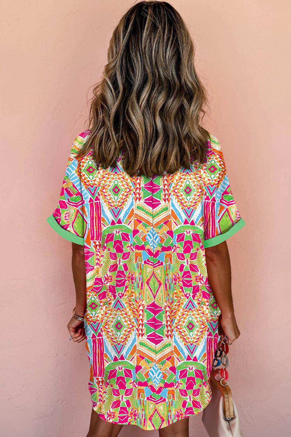 Orange geometric print contrast short sleeve shirt dress by Carmine Juneberry, featuring bold patterns and a stylish fit.