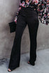 Black satin flare tailored pants from Harlequin Daisy, shown on a model, featuring a sleek fit and elegant design for Bath & Beauty.