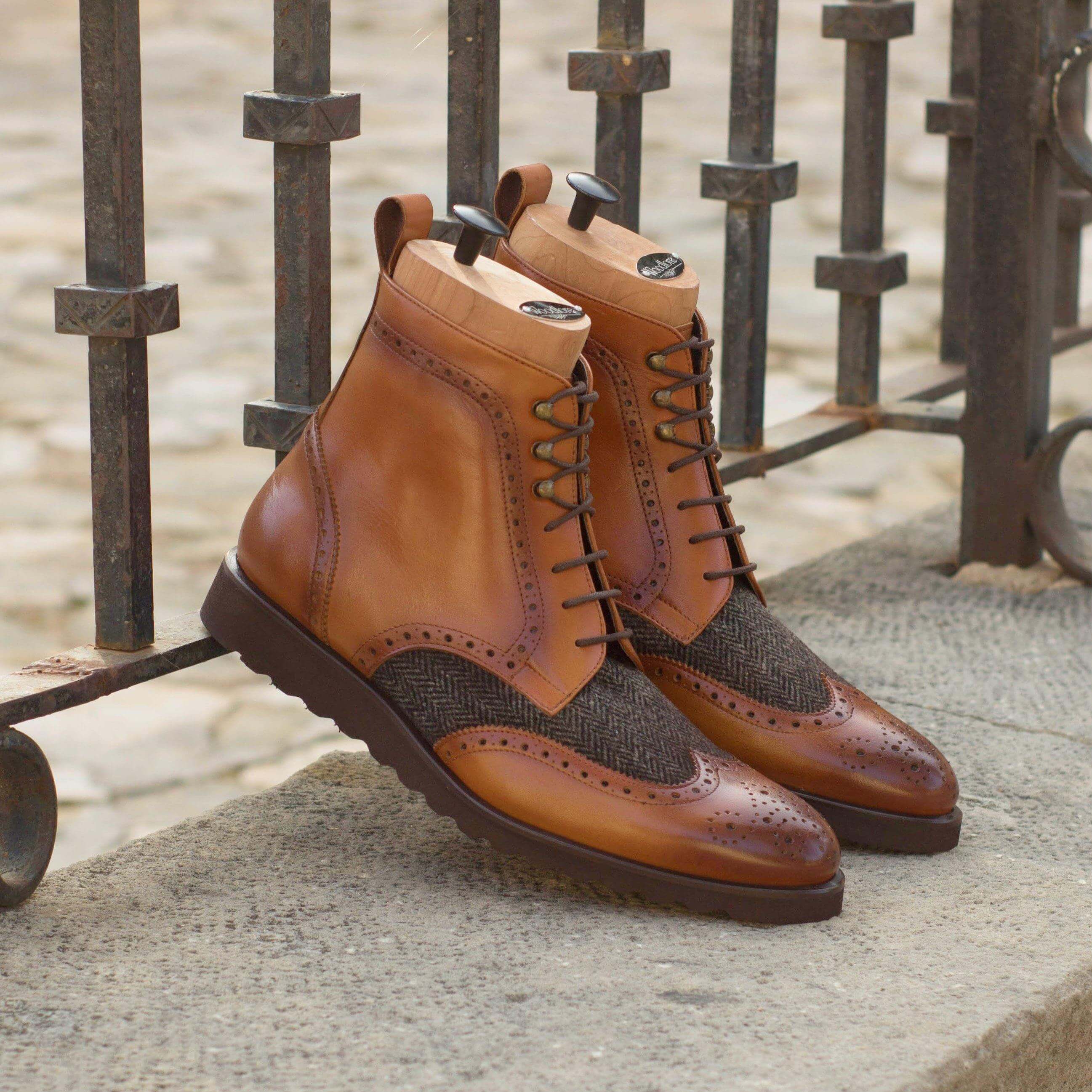 Magenta Apple Cina Military Brogue Boots II footwear with leather upper, brogue details, and sturdy sole.