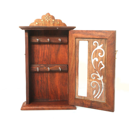 Sheesham wood wall-mounted key holder with leaf design and hooks, ideal for home decor and organization.