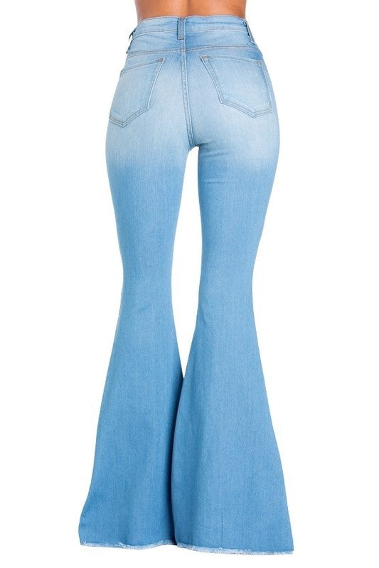 Light wash Jade Icarus Logan bell bottom jeans with 30-inch inseam, showcasing the stylish denim fabric and retro flare design.