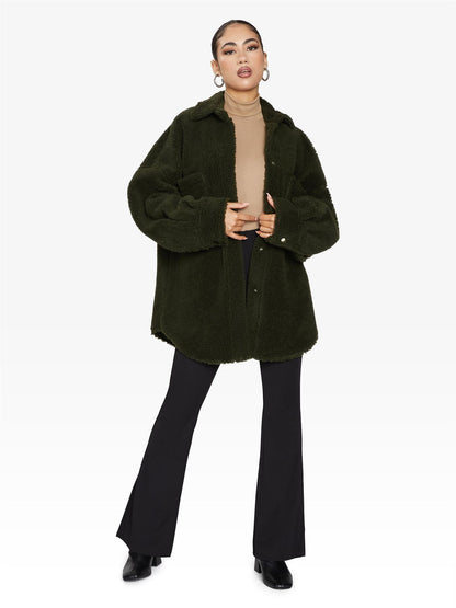 Rose Eleusis oversized patch pocket borg teddy shacket with a cozy, plush exterior and large patch pockets for a stylish, relaxed look.