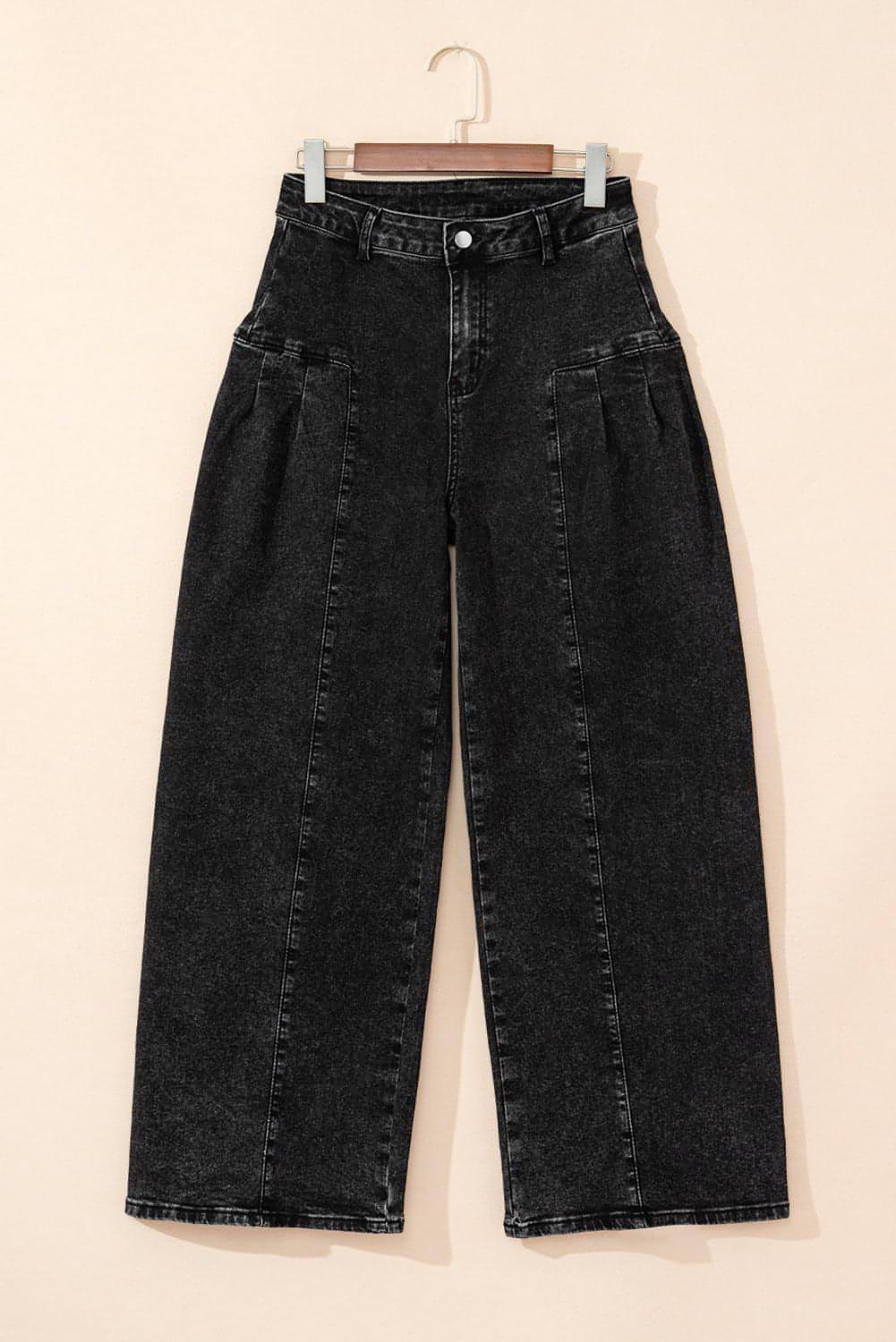 Dark grey pleated wide-leg denim pants by Carmine Juneberry with mineral wash finish, showing the relaxed fit and stylish design.