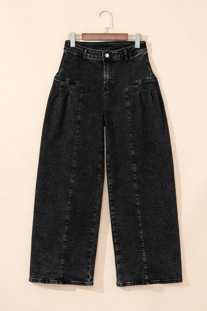 Dark grey pleated wide-leg denim pants by Carmine Juneberry with mineral wash finish, showing the relaxed fit and stylish design.
