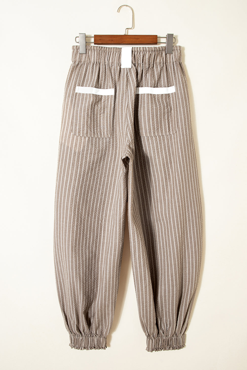 Byzantium Bay stripe drawstring cargo pocket jogger pants with relaxed fit and elastic waistband, shown in dark fabric.