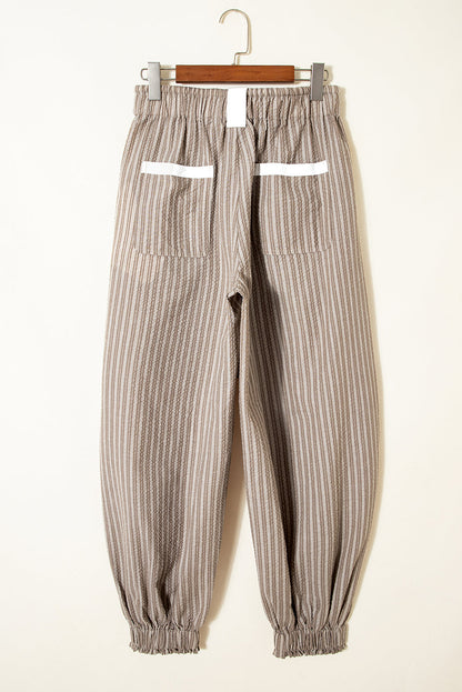 Byzantium Bay stripe drawstring cargo pocket jogger pants with relaxed fit and elastic waistband, shown in dark fabric.