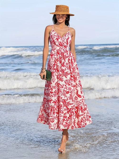 Printed spaghetti strap midi dress by Pear Daisy, featuring a stylish, lightweight design perfect for casual summer wear.