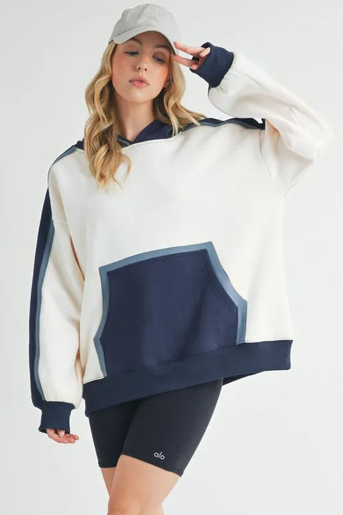 Color block kangaroo pocketed hoodie by Pear Daisy, Aemi + Co, featuring a cozy design and casual style for home and garden use.