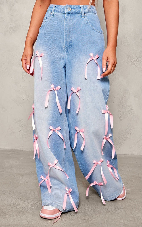 Carmine Juneberry Bow High Waist Wide Leg Jeans in Haute Edition, showing front view with high waist and wide-leg cut.