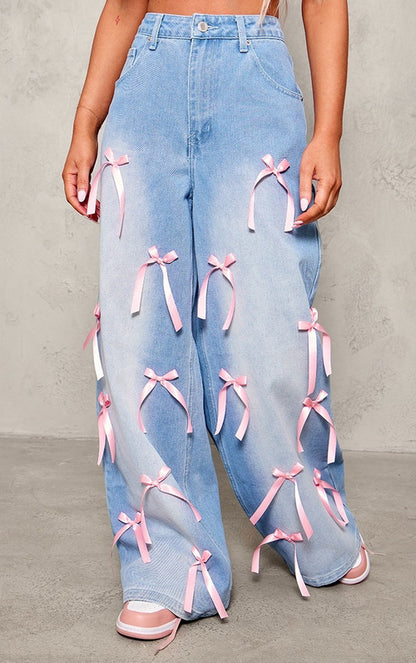 Carmine Juneberry Bow High Waist Wide Leg Jeans in Haute Edition, showing front view with high waist and wide-leg cut.