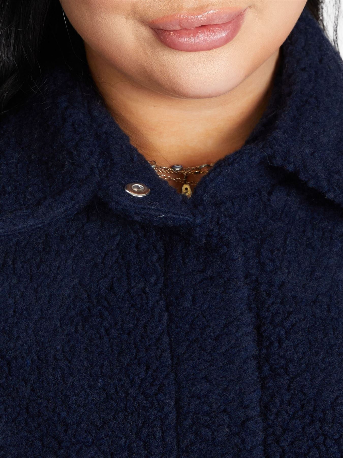 Rose Eleusis oversized patch pocket borg teddy shacket with a cozy, textured fleece exterior and large front pockets.