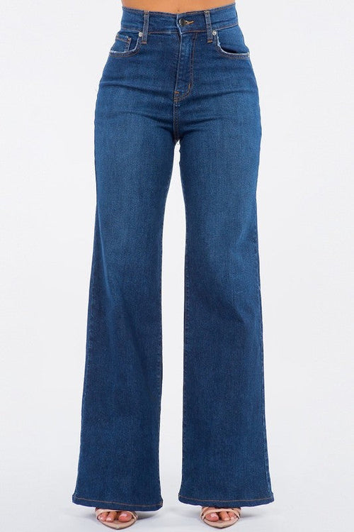 Dark blue Olivia wide leg jeans by Jade Icarus, showcasing fit and style with a high waist and relaxed wide leg silhouette.