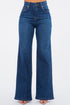 Dark blue Olivia wide leg jeans by Jade Icarus, showcasing fit and style with a high waist and relaxed wide leg silhouette.