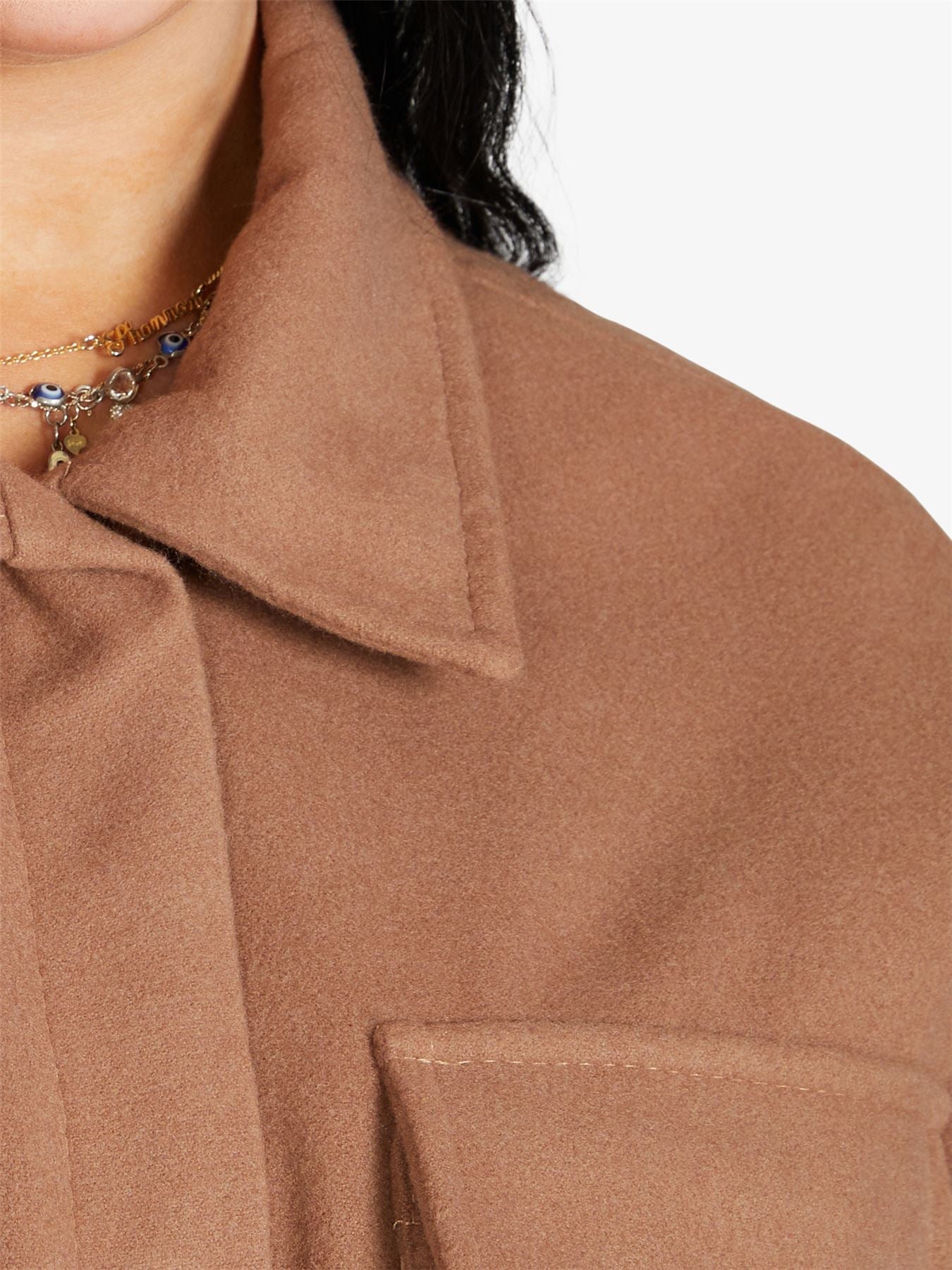 Oversized longline shacket by Rose Eleusis, stylish jacket with a relaxed fit, long sleeves, and a cozy, layered look.