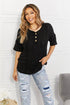 Black Carmine Juneberry BOMBOM At The Fair Animal Textured T-shirt with playful animal print design.