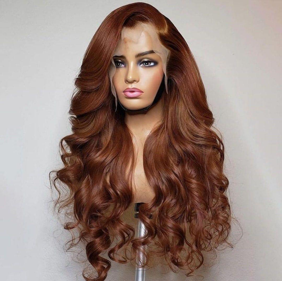Carmine Juneberry LuxeFlow Real Hair Wig designer haircare product with luxurious, natural-looking hair in a sleek style.
