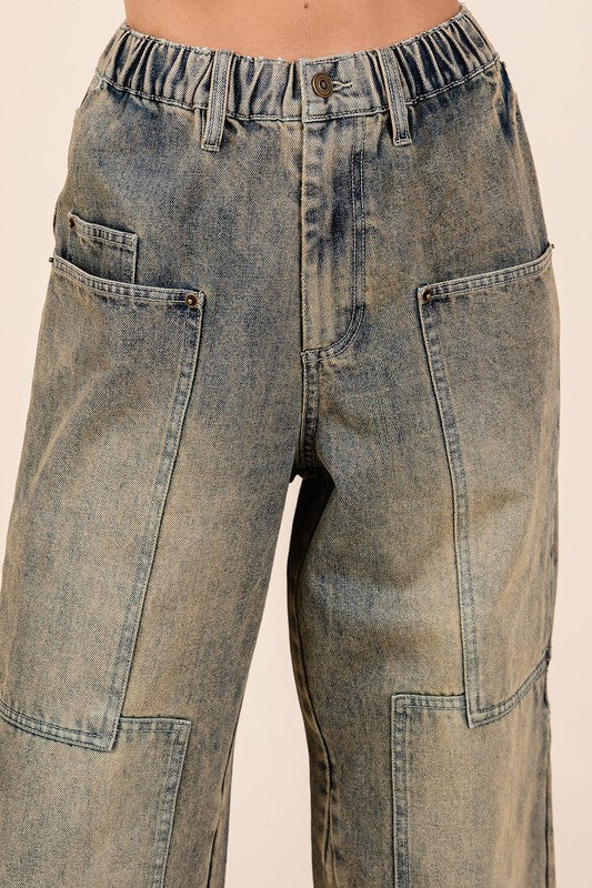Jade Icarus Mittoshop washed wide leg jeans with pockets, casual denim pants with a relaxed fit and front and back pockets.