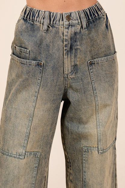Jade Icarus Mittoshop washed wide leg jeans with pockets, casual denim pants with a relaxed fit and front and back pockets.