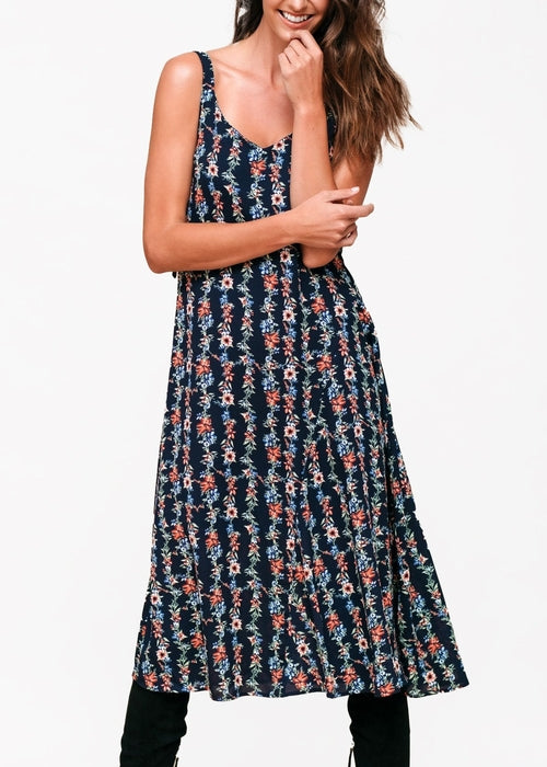 Black floral V-neck sleeveless maxi dress by Lemon Hera, flowing fabric with a vibrant floral print, perfect for summer occasions.