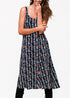 Black floral V-neck sleeveless maxi dress by Lemon Hera, flowing fabric with a vibrant floral print, perfect for summer occasions.