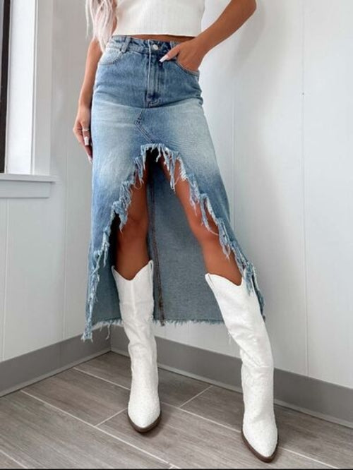Women’s high-waist raw hem asymmetry denim skirt from Taupe Oliver, styled with a casual top.