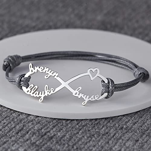 Green Millie mom bracelet with infinity symbol featuring engraved kids’ names, personalized jewelry for moms.