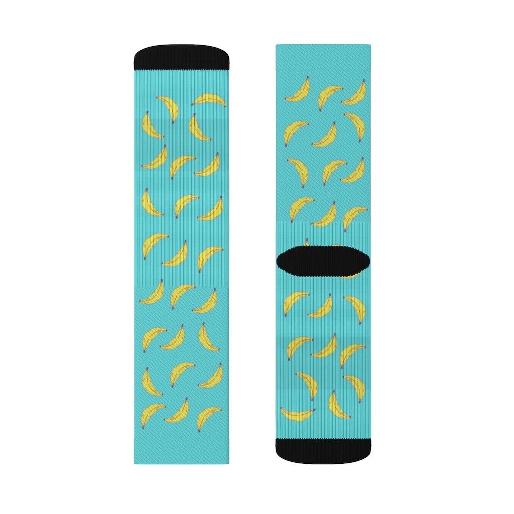 Yellow Pandora novelty banana socks with playful spot the odd out design, featuring colorful spots on bright yellow fabric.