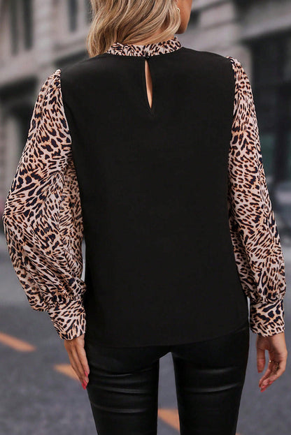 Black leopard print lantern sleeve blouse by Carmine Juneberry, stylish women&