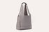Pink Lucy modern tote bag made of durable accessories material, with sleek design and top handles, ideal for everyday use.